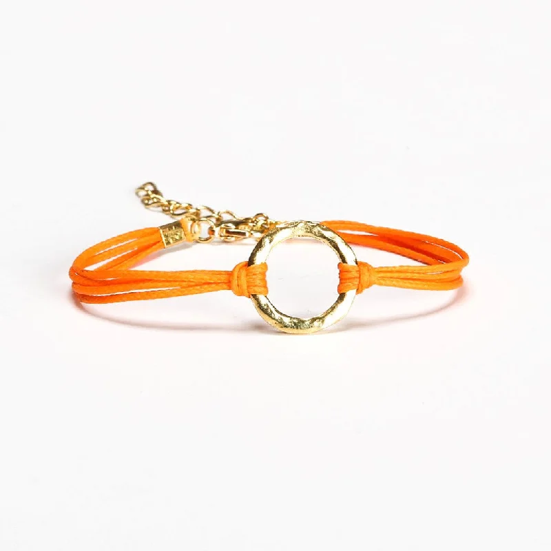 Ladies bracelets with twist charms -Orange cord bracelet with a gold circle charm, gift for her