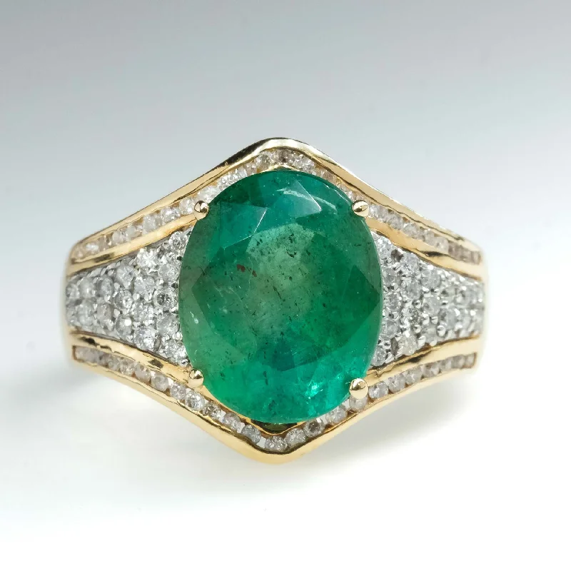 ladies-white-gold-band-rings-3.67ct Oval Natural Emerald and Diamond Accented Ring in 14K Yellow Gold