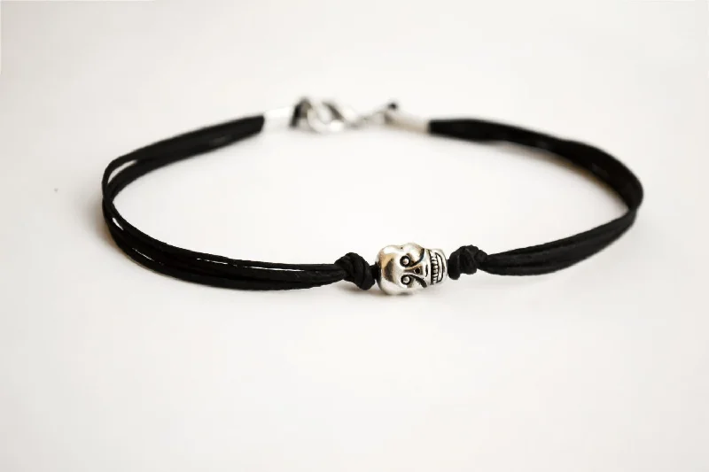 Ladies bracelets bold elegance -Men's bracelet with a silver skull bead charm and a black cord, gift for him