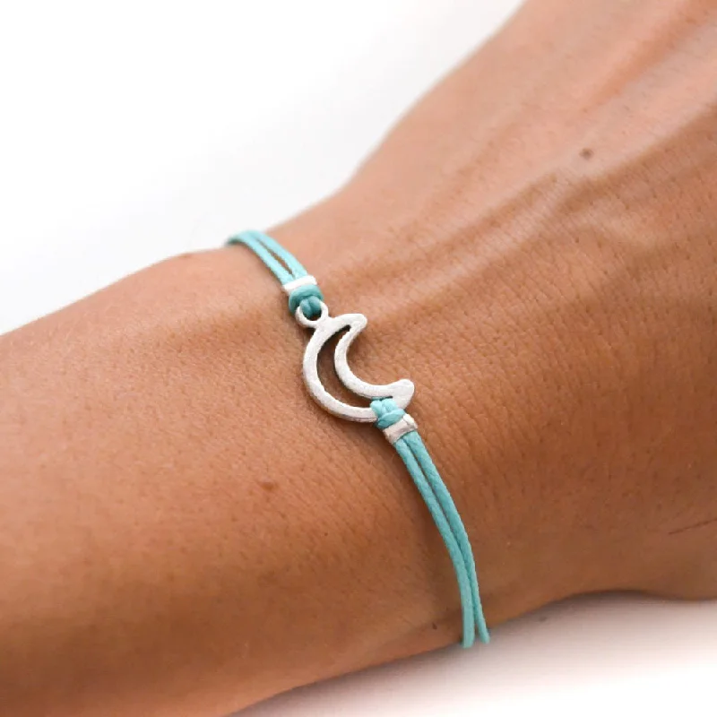 Ladies bracelets with galaxy charms -Turquoise cord bracelet with a silver crescent moon charm, gift for her