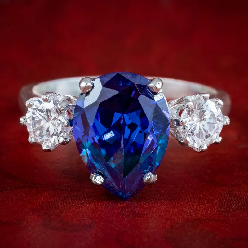 ladies-luxury-diamond-rings-Edwardian Style CZ Tanzanite Trilogy Ring