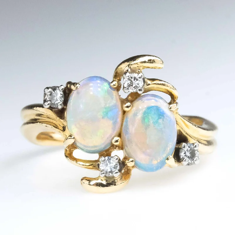 ladies-pearl-eternity-rings-Oval Opals and Diamond Accented Gemstone Ring in 14K Yellow Gold