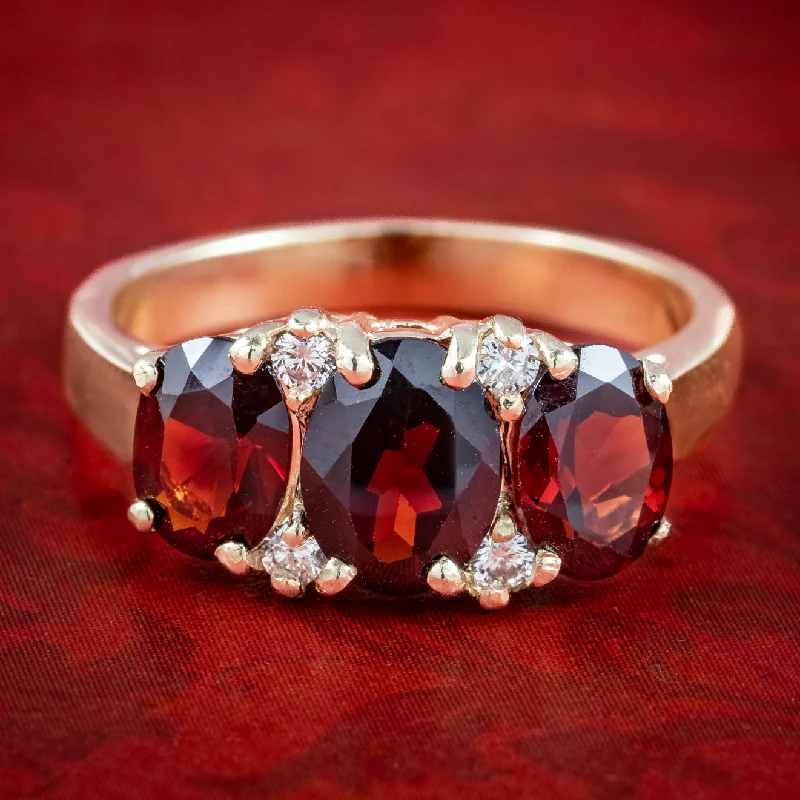 ladies-infinity-silver-rings-Victorian Style Garnet Diamond Trilogy Ring