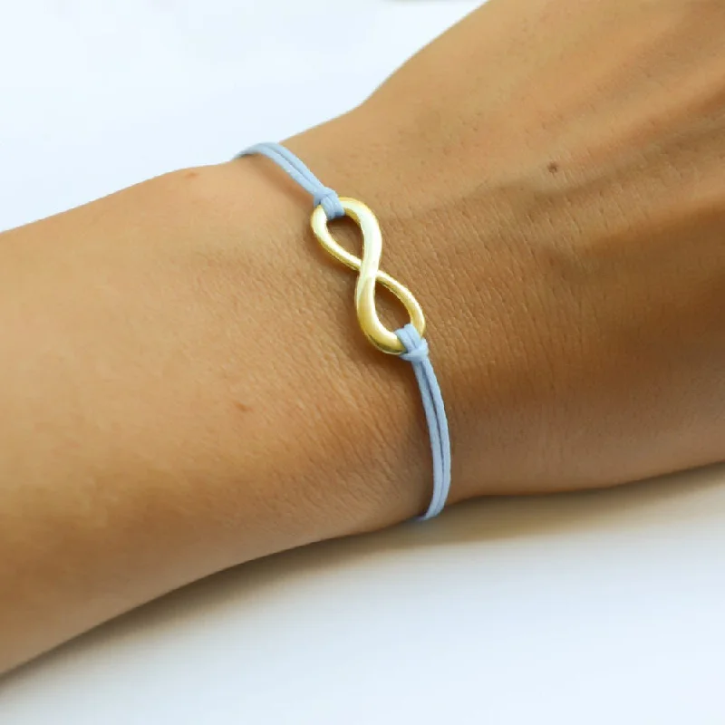 Ladies bracelets with silk threads -Blue cord bracelet with a gold tone infinity endless charm, handmade mothers day gift, preppy jewelry