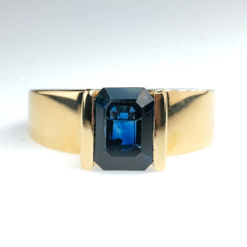 ladies-name-diamond-rings-1.95ct Bar-Set Emerald Cut Blue Sapphire Solitaire Ring in 14K Yellow Gold