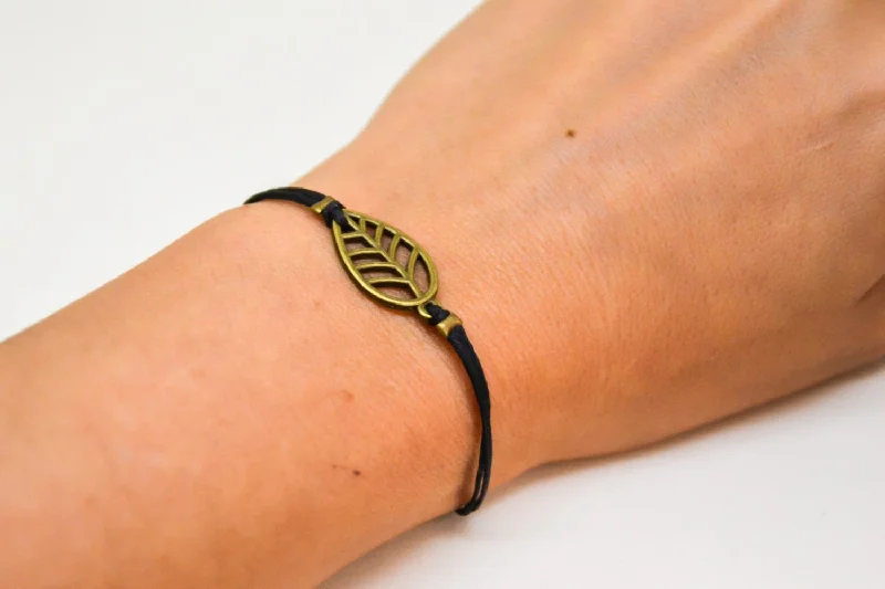 Ladies bracelets with trail charms -Bronze leaf charm bracelet, black cord, gift for her, adjustable, preppy jewelry