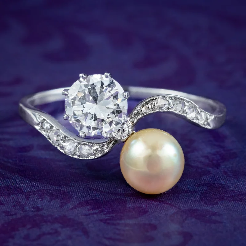 ladies-bridal-diamond-rings-Antique Edwardian Pearl Diamond Toi Et Moi Twist Ring