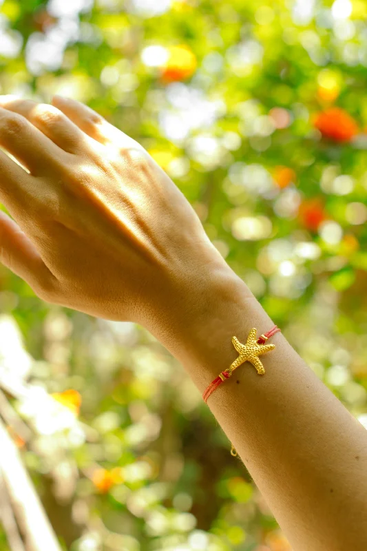 Ladies bracelets with lunar charms -Gold starfish bracelet red cord womens bracelet