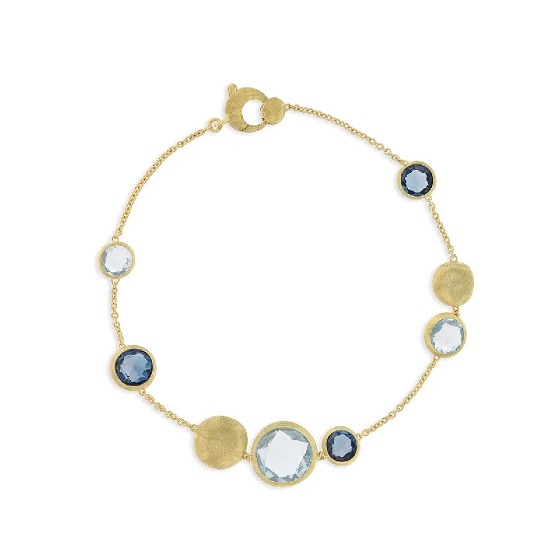 Ladies bracelets with plum garnet -18K Yellow Gold Mixed Blue Topaz Bracelet