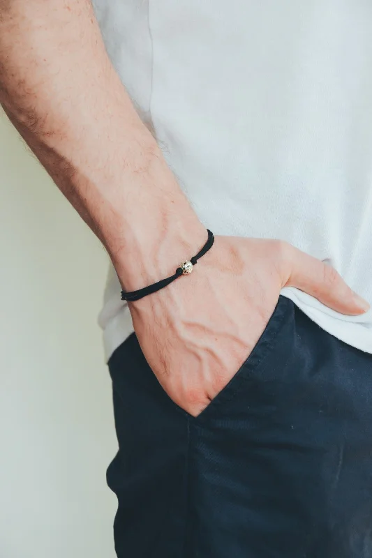 Ladies bracelets for healers -Men's bracelet with silver bead charm and a black cord