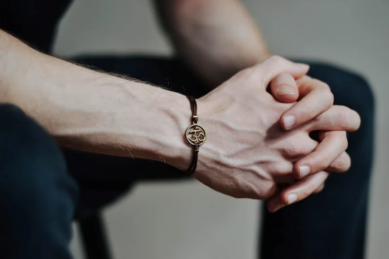 Ladies bracelets bold modernity -Men's bracelet with antique bronze Om charm, brown cord, fathers day gift for him