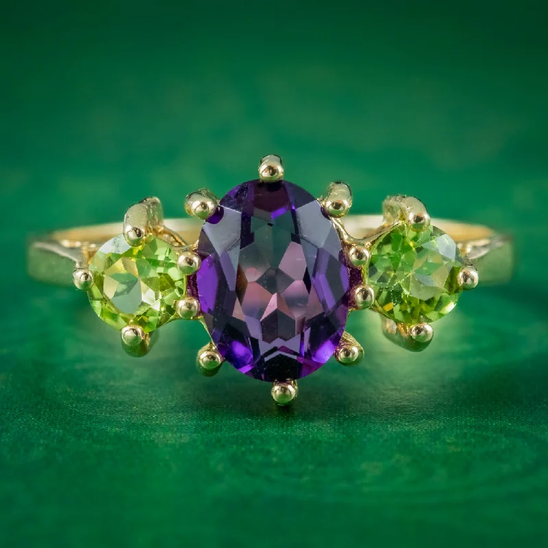 ladies-princess-cut-emerald-rings-Edwardian Suffragette Style Amethyst Peridot Trilogy Ring 9ct Yellow Gold