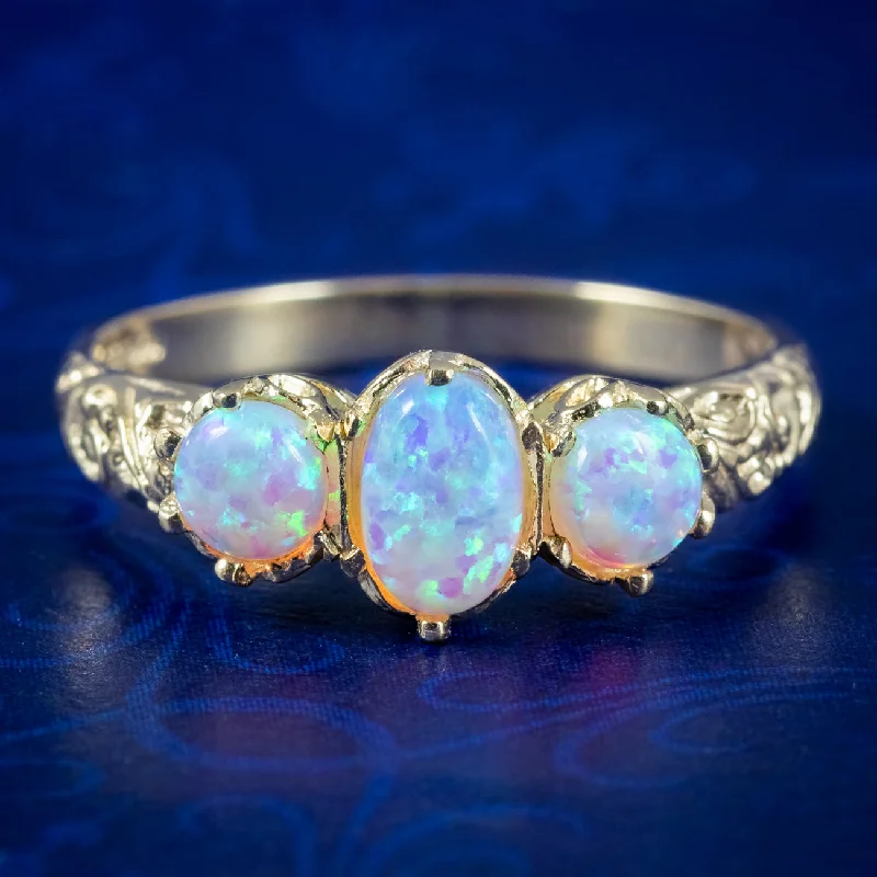 ladies-emerald-cut-rose-gold-rings-Victorian Style Opal Trilogy Ring 9ct Gold