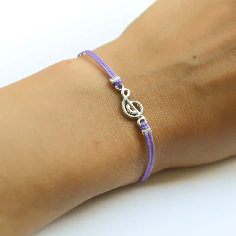 Ladies bracelets with spark charms -Purple cord bracelet with a silver Treble clef charm, music note jewelry