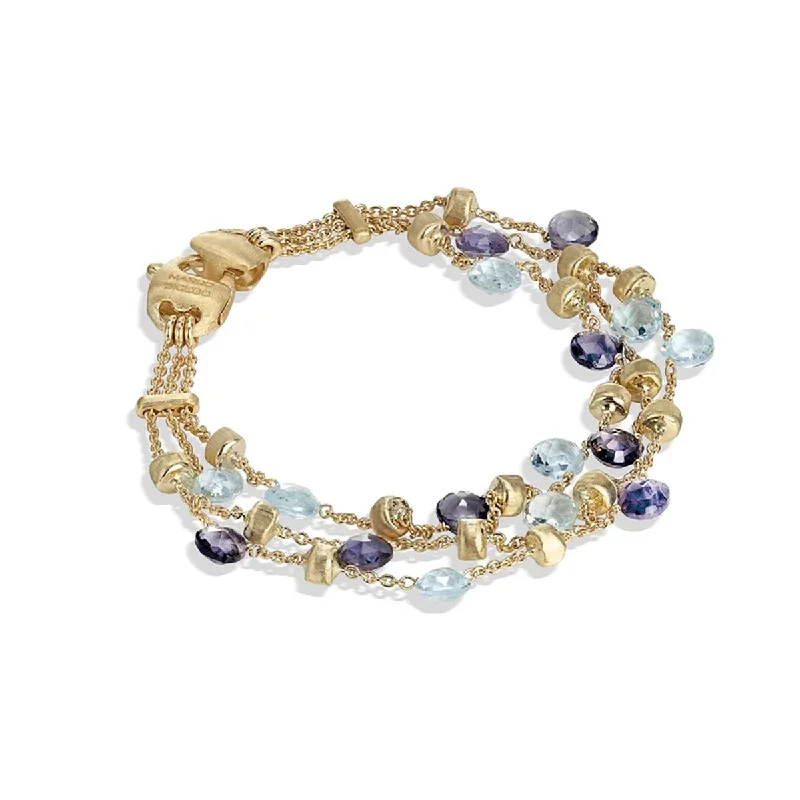 Ladies bracelets with bloom charms -18K Yellow Gold Iolite and Blue Topaz Three Strand Bracelet