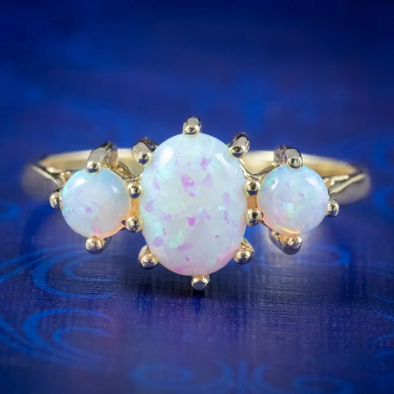 ladies-emerald-cut-diamond-rings-Victorian Style Opal Gold Trilogy Ring 9ct Gold