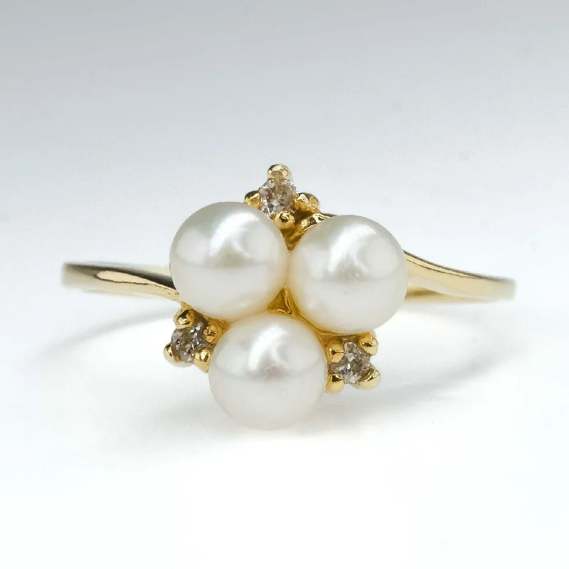 ladies-cushion-cut-silver-rings-Pearl & Diamond Accented Bypass Ring Size 6.5 in 14K Yellow Gold